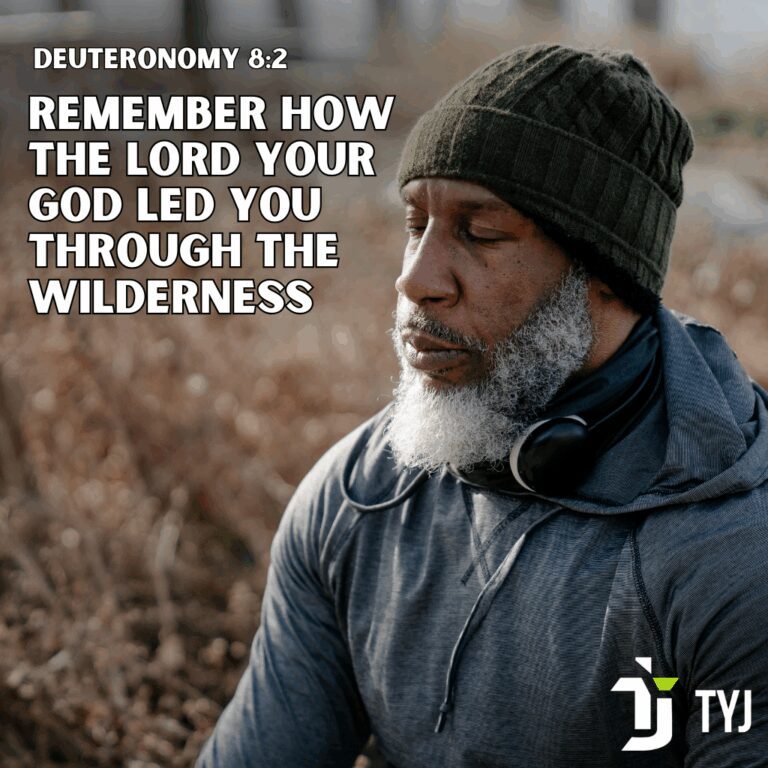 Man reflecting outdoors with the scripture Deuteronomy 8:2 about God leading through the wilderness.